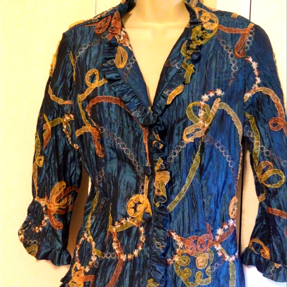 Truly beautiful Teal jacket, that I sadly have outgrown.  Size 8.